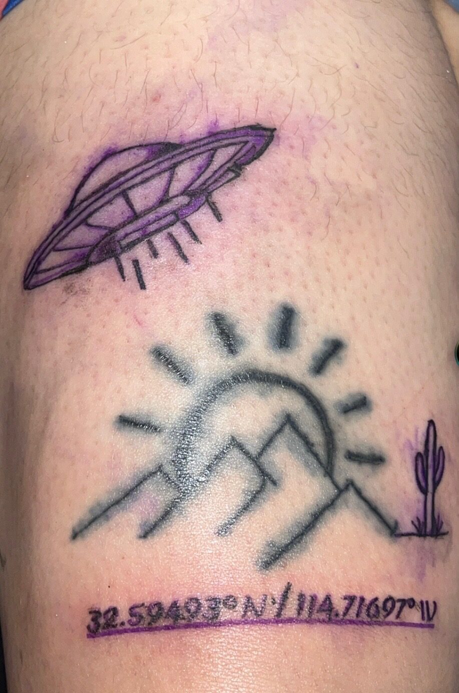 Desert landscape tattoo with sun, mountains and coordinates by Yaa Z Studios